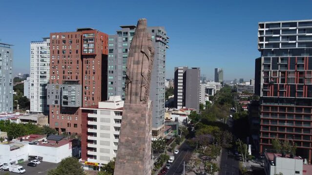 close flying clockwise around back Monumento a los Ninos Heroes in Guadalajara