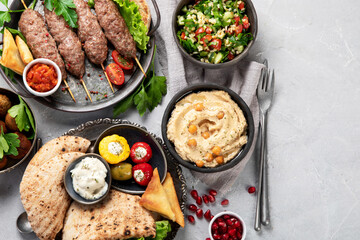 Lebanese food assortment on light background.