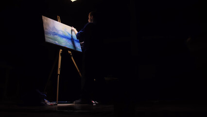 Artist copyist paint seascape with ship in ocean. Craftsman decorator draw as boat sail on blue sea...