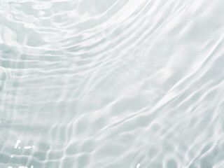 Blurred ripple water texture on white background. Shadow of water on sunlight. Mockup for product,...