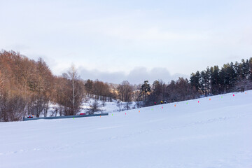 Winter mountain forest located on the ridge of the tourist route.