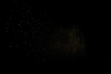 Gold Glitter Texture Isolated on Black Background. Golden stardust. Amber Particles Color. Sparkles Rain. Vector Illustration, Eps 10.