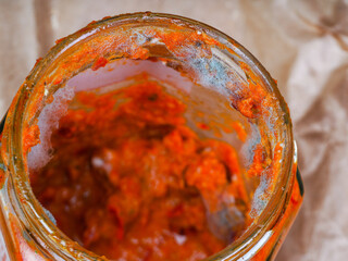 tomato sauce jar with grow mold on it