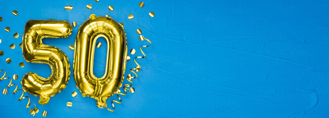number fifty gold foil balloon. Birthday or anniversary card with the inscription 50. blue concrete...