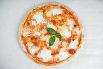 margarita pizza with herbs on a white background
