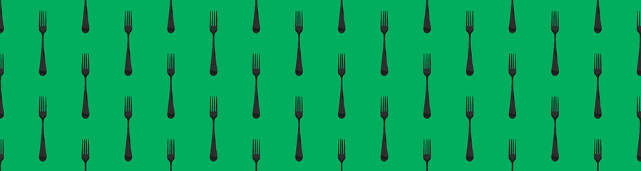 Seamless pattern. Fork top view on green background. Template for applying to surface. Flat lay. Banner for insertion into site. 3D image. 3D rendering.
