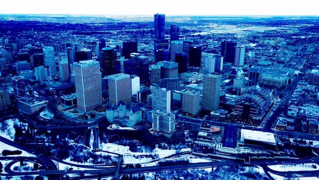 Winter Edmonton Downtown City Snow Covered Building Aerial Flyout Backwards From North To South With Cliffs Edge Overlooking Birds View Of The Convention Centers Vintage Replica Chateaus Dawn SNW3-3