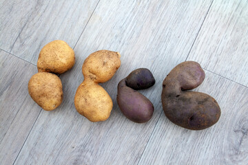 Fototapeta na wymiar potatoes, ugly potatoes, heart, food, background, texture, vegetables, place for text