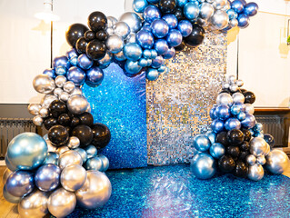 a photo zone with shiny balloons and a wall with sequins. festive decor. children's party. services...