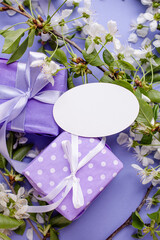 gift boxes with spring flowers on Very Peri
