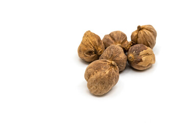 Close up dried Thai Cardamon on white background, front view dried Thai Cardamon, selected focus in the front seed.