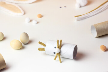Reuse concept art from toilet tube. Eco friendly bunny craft. Handmade decoration easter rabbit....