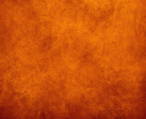 Bright orange gritty grunge background abstract marbed wall or parchment paper texture