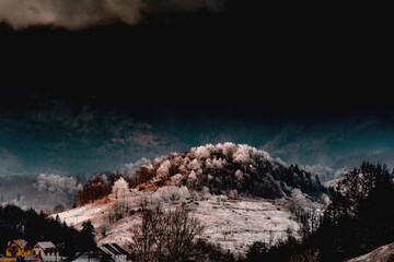 Fototapeta na wymiar Moody winter landscape in Bucegi Mountains, Romania