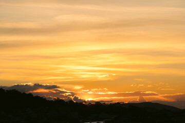 Beautiful view of sky with clouds at sunrise. Partly cloudy. Colorful sunset. Natural sky background texture, beautiful color.