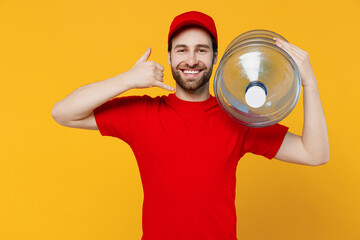 Professional delivery guy employee man in red cap T-shirt uniform workwear work as dealer courier...