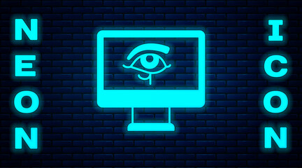 Glowing neon Eye of Horus on monitor icon isolated on brick wall background. Ancient Egyptian goddess Wedjet symbol of protection, royal power and good health. Vector