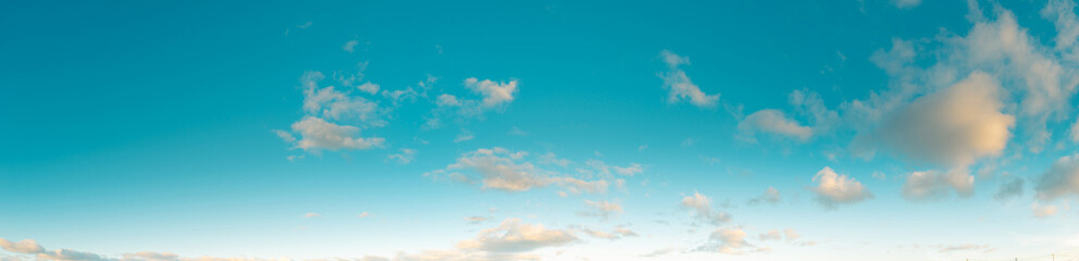 Beautiful view of sky with clouds at sunrise. Partly cloudy. Natural sky background texture, beautiful color.