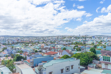 Aerial view of Pleiku city in the morning, far away is Ham Rong mountain. Travel and landscape concept.