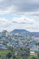 Obraz premium Aerial view of Pleiku city in the morning, far away is Ham Rong mountain. Travel and landscape concept.