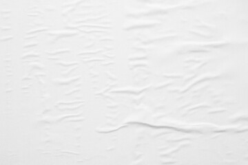 Blank white crumpled and creased paper poster texture background