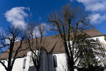 White facade of old Franciscan Church at the old town of Solothurn on a sunny winter day. Photo...