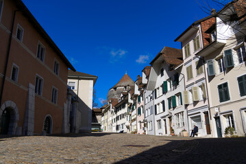 Fototapeta na wymiar Beautiful historic houses at the old town of Solothurn on sunny winter day. Photo taken February 7th, 2022, Solothurn, Switzerland.