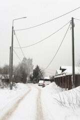 Power poles in the countryside on a winter day.