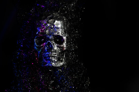 human silver skull on black background