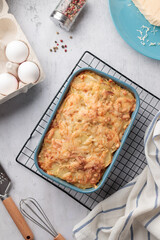 Homemade potato pie in a blue plate