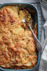 Homemade potato pie in a blue plate