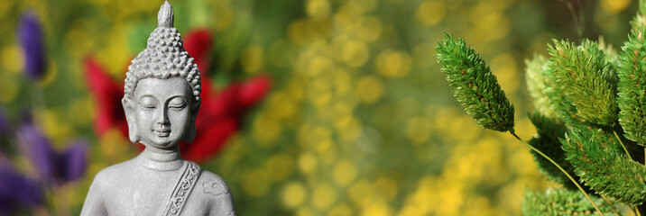 Buddha Statue With Field of Yellow Flowers in Background Shallow DOF