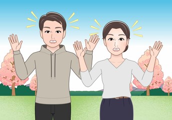 公園にいる若い男女