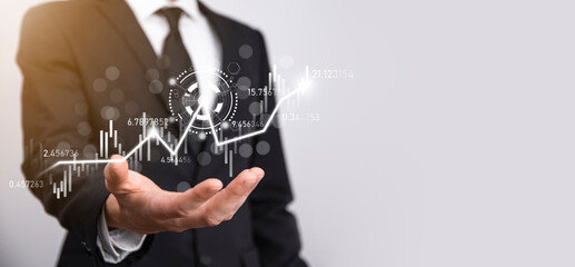 Hand hold sales data and economic growth graph chart. Business planning and strategy. Analysing...