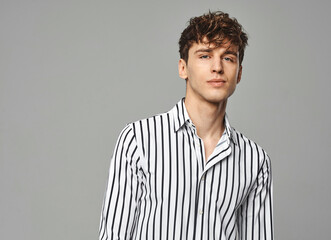 Portrait of hansome man wear striped shirt in black and white