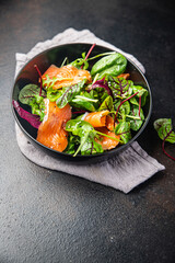 salmon salad boiled egg, green leaves lettuce fresh meal food diet snack on the table copy space food background 