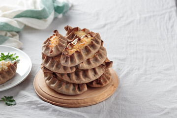 Traditional Finnish pastry - Karelian rye pie with rice porridge