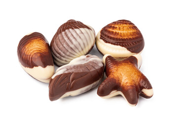 Chocolate sweets shaped as seashells isolated on white background