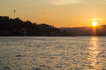 The sunset in city with together sea Anadoluhisari Istanbul, turkey