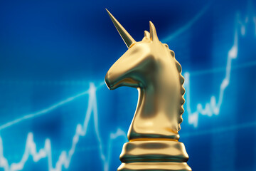 Golden chess piece unicorn with  stock market chart background  © peterschreiber.media