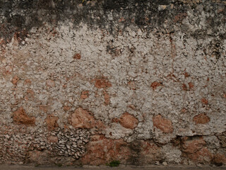 pattern gray color of modern style design decorative uneven cracked real stone wall surface with cement
