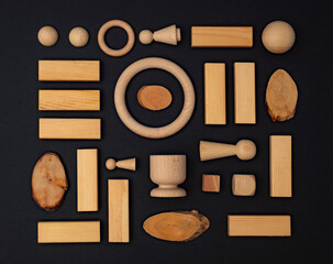 Random wooden pieces isolated on black background, 