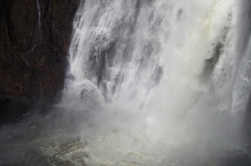 Rocky Face of Montmorency Falls waterfall cascade near Quebec City, Canada, natural landmark and...