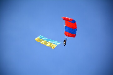 paragliding in the blue sky