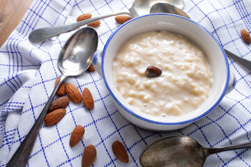 homemade rice pudding topped with one almond