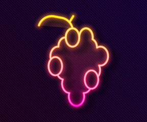 Glowing neon line Grape fruit icon isolated on black background. Vector
