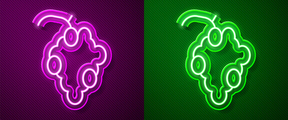 Glowing neon line Grape fruit icon isolated on purple and green background. Vector