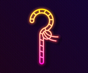 Glowing neon line Crook icon isolated on black background. Ancient Egypt symbol. Scepters of egypt. Vector