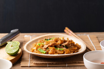 Thai food (Pad See Ew), Stir fried rice noodles with soy sauce, egg, kale and pork