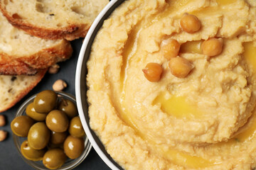 Concept of tasty food with hummus, top view